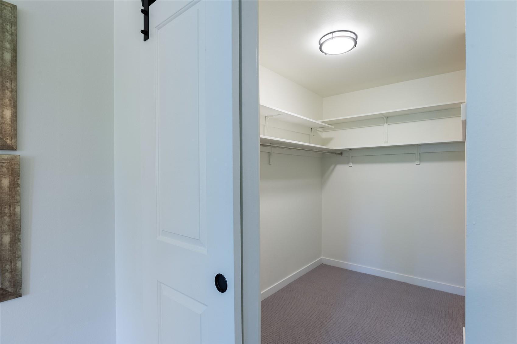 Primary walk-in closet. - 600 S Clinton St