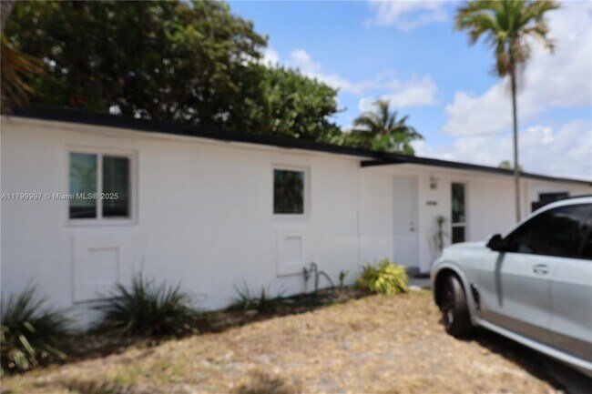 Building Photo - 19300 NW 47th Ave