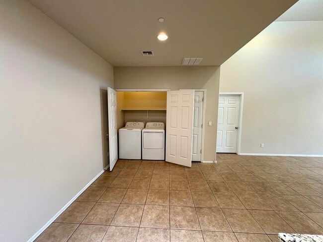 Building Photo - 8940 W Olive Ave