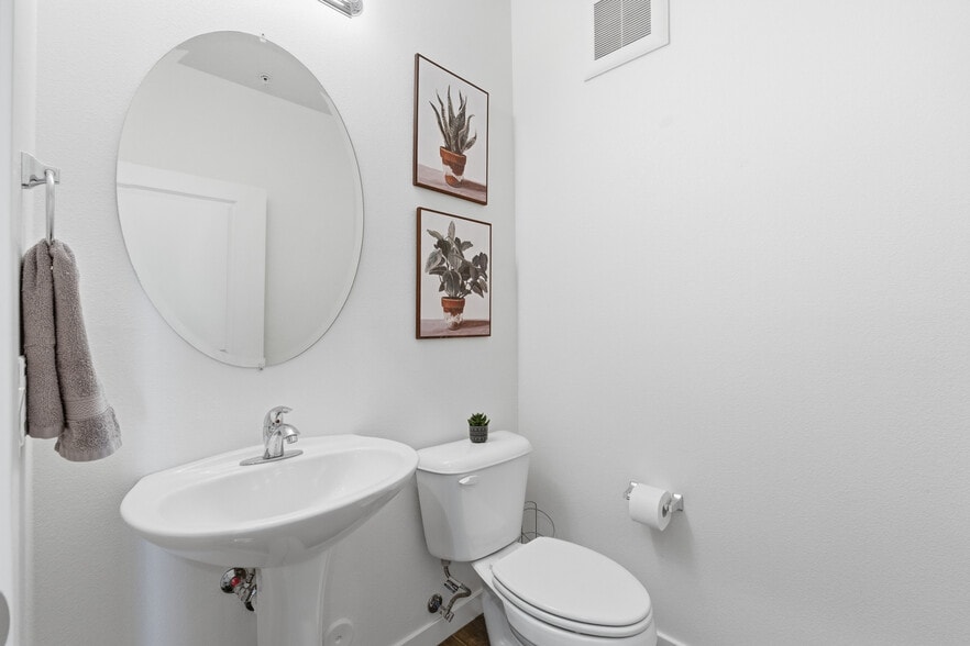 Convenient half bathroom for guests. - 2511 W Queen Creek Rd