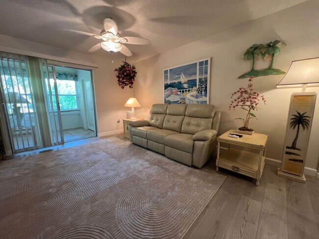 Building Photo - *55+ Community* 2nd floor furnished Condo