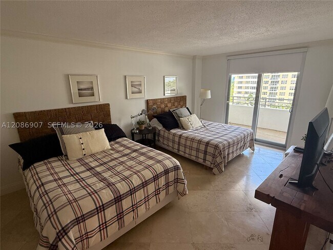 Building Photo - 5555 Collins Ave