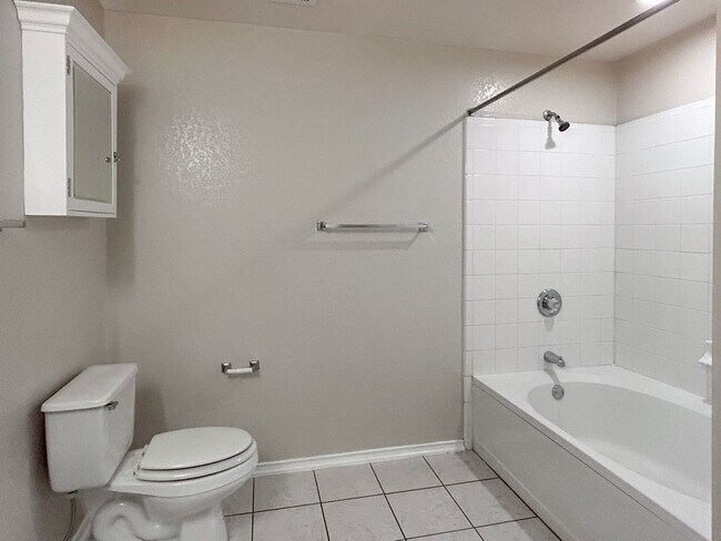 Building Photo - Northeast 3/2 with New Bedroom Floors & Covered Patio