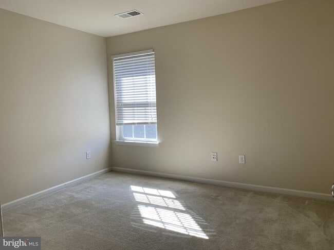 Building Photo - 8379 Academy Rd