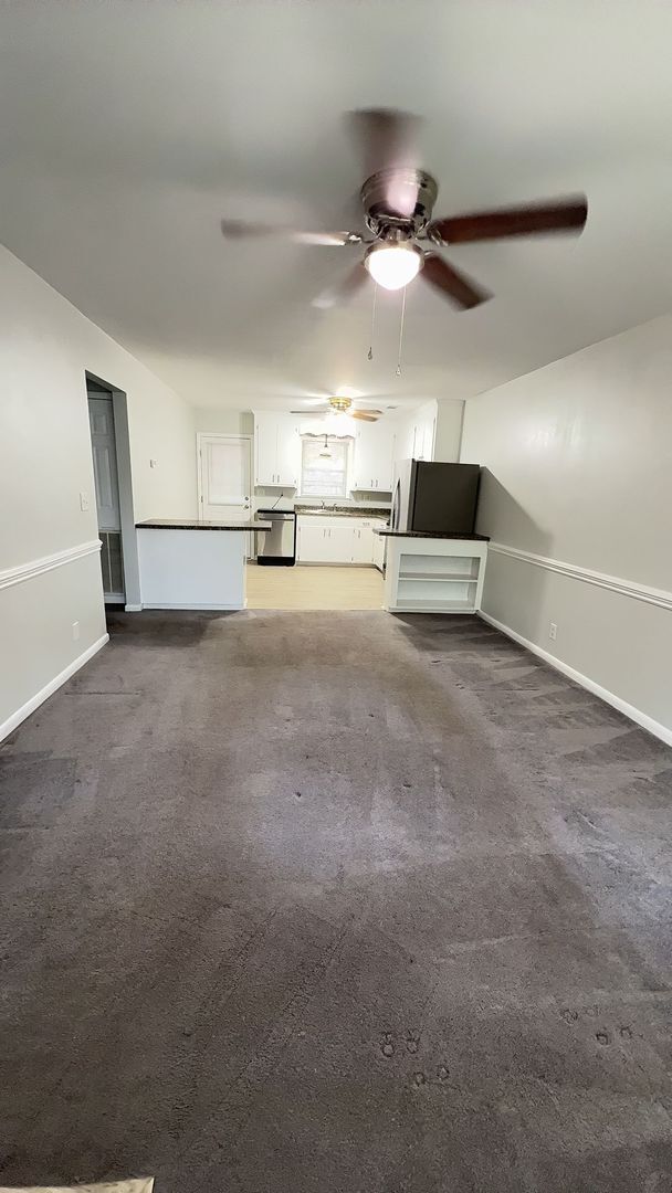 Building Photo - 2BR Duplex with Washer/Dryer + Fresh Updates + Lawn care included