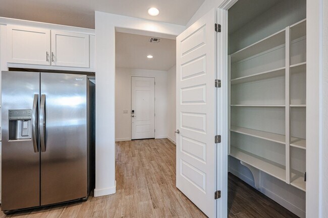 Building Photo - COMING SOON!! Recently built 5-Bedroom Home in Goodyear with Upgrades & Resort-Style Amenities