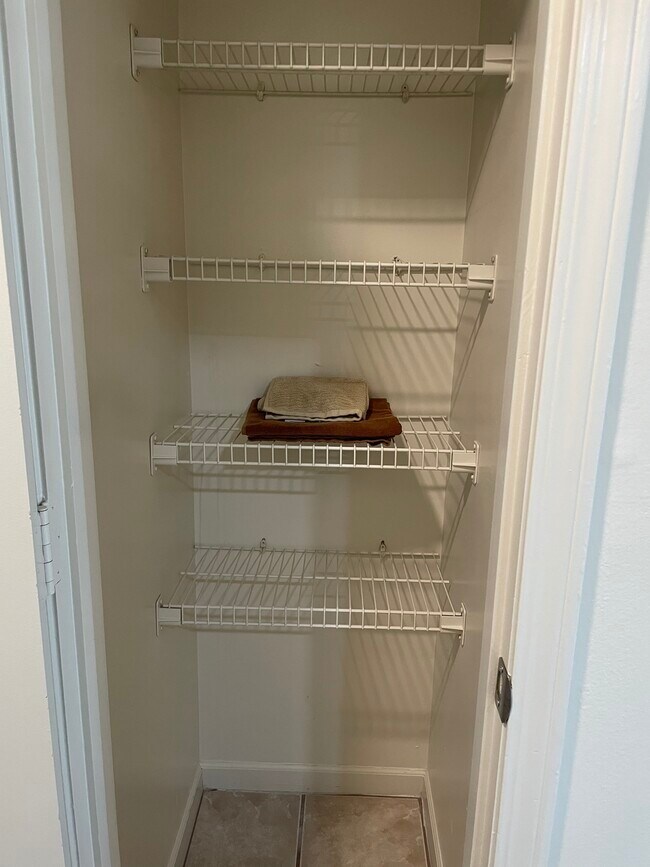 Hall linen closet - 12447 Coursey Blvd