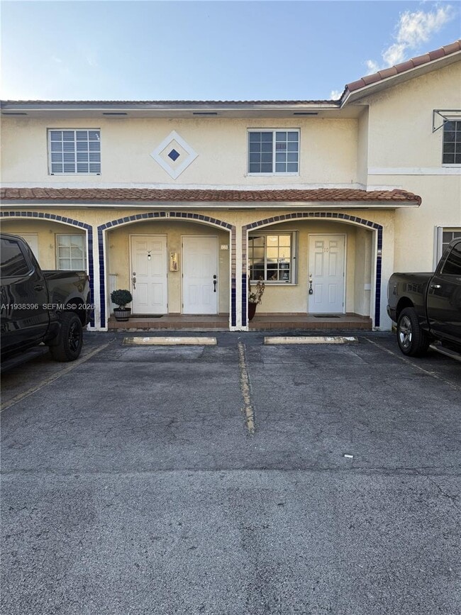 Building Photo - 10101 W Okeechobee Rd