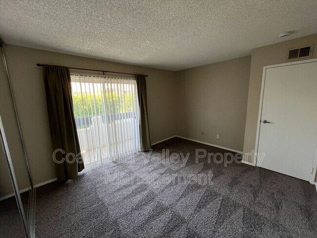 Building Photo - 1950 S Palm Canyon Dr