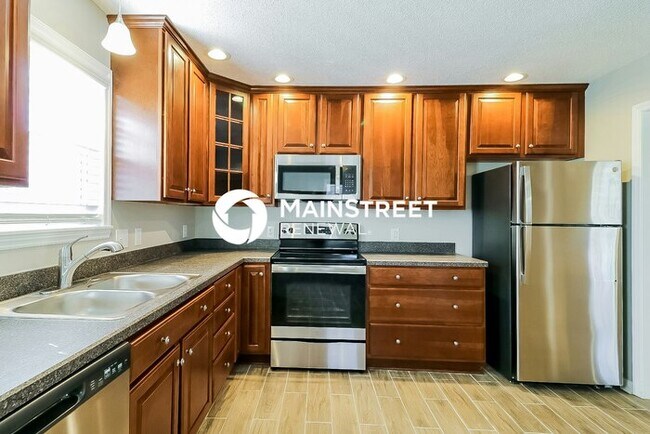 Building Photo - 4 Bedroom Pet-Friendly Home in RALEIGH, NC with Main Street Renewal
