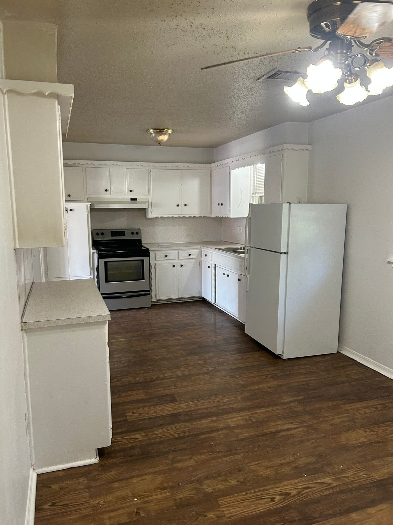 forward and to the left is the kitchen - 1317 Lakecrest Dr
