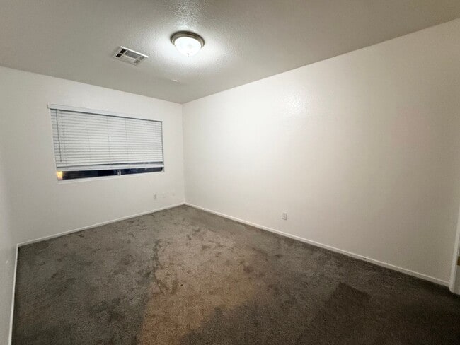 Building Photo - $500 OFF 1ST MONTHS RENT Updated 3-Bedroom Townhome in Gated Community with Pool Access