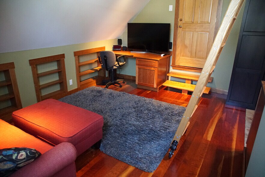 Built-in desk, large storage behind knee wall, armoire, sealed unused door to main house office - 69 S Shannon Ave