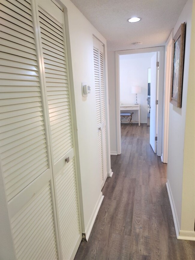 Building Photo - Bird Bay Village Annual Rental – Furnished 1st Floor Unit with Covered Parking