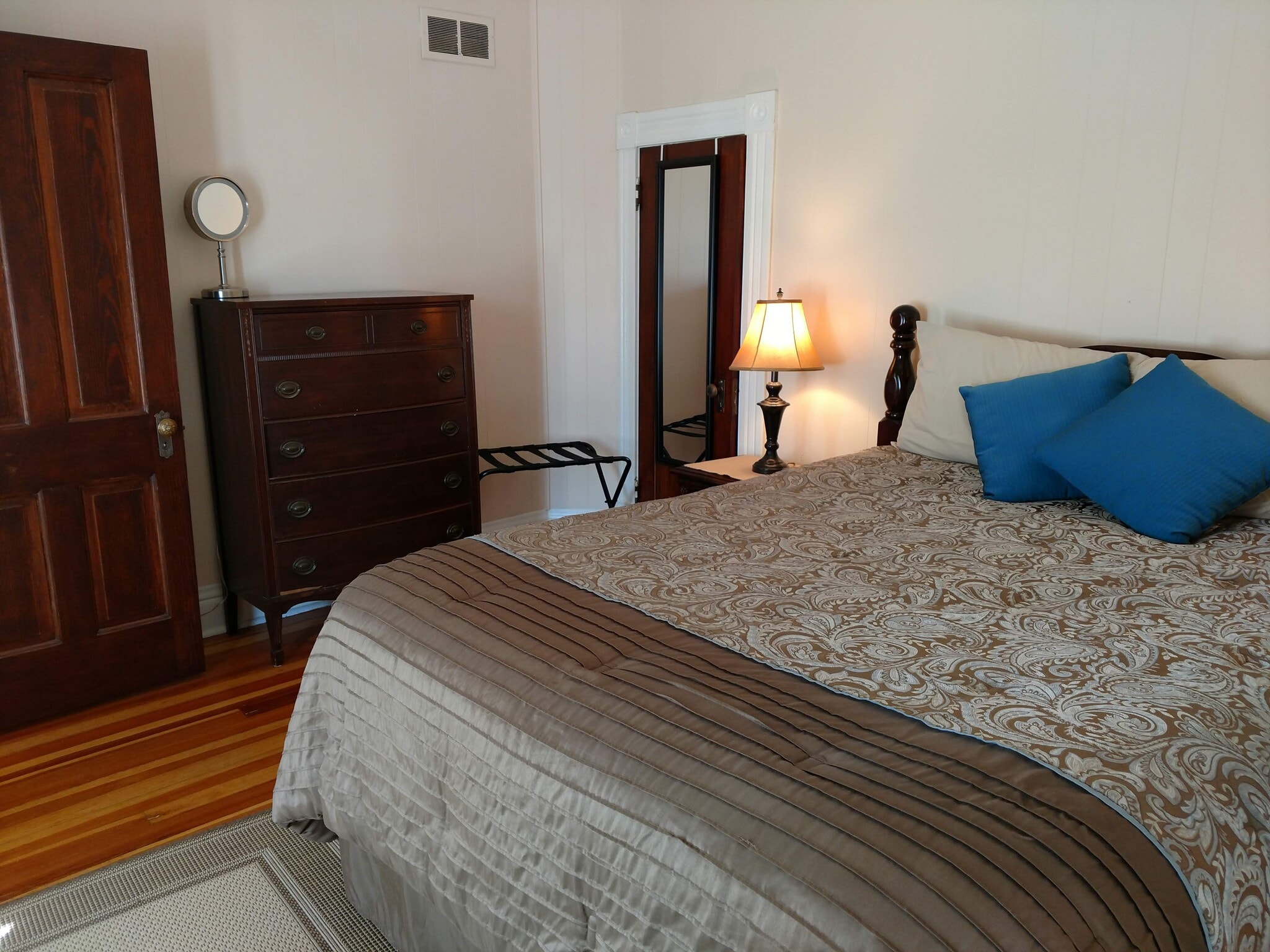 Front bedroom of view of closet door and dresser (furnishings not included with rental) - 607 Harrison Ave