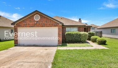Building Photo - 4 Bed, 2 Bath Home with Fenced Yard & Garage / Pet-Friendly / Coming Soon!