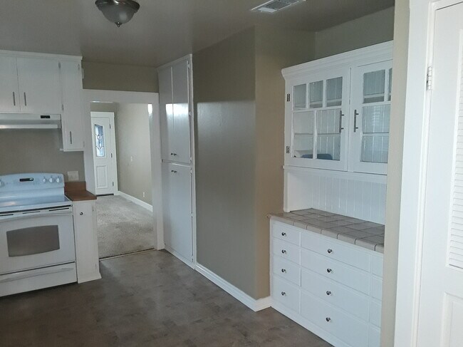 Kitchen looking into Living room - 608 Elefa St
