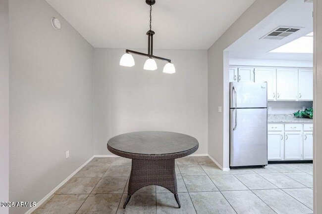 Building Photo - 9451 E Becker Ln