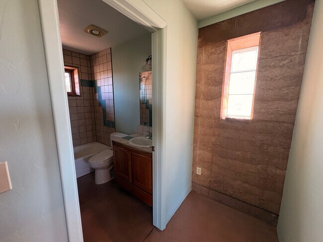 Building Photo - Desert Home on 3.3 Acres with Rooftop Views & Unique Rammed Earth Design