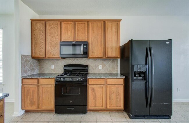 Building Photo - 7547 Oakwood Canyon Dr
