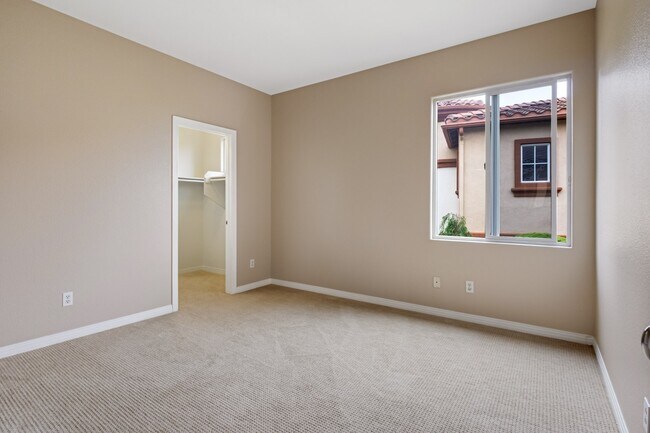 Building Photo - Gated corner lot home walking distance to the beach