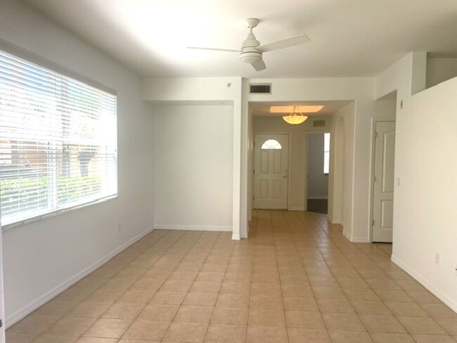 Building Photo - Elegant 3 Bedroom End-Unit Condo with Screened Lanai & Pond Views and A Private Garage