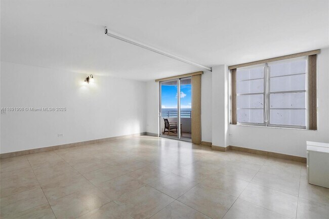 Building Photo - 5555 Collins Ave