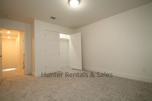 Building Photo - Upscale Four-Bedroom Townhome!