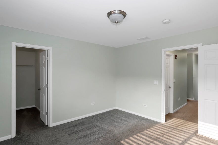 Second Bedroom with WalkIn Closet - 910 Neudearborn Ln