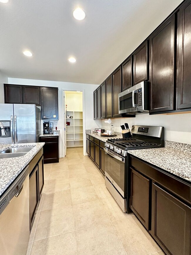 Building Photo - BEAUTIFUL VERRADO 3 BEDROOM PLUS DEN WITH ...