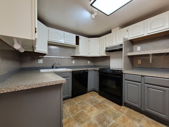 Building Photo - Bright Four-Bedroom Home with Spacious Outdoor Area