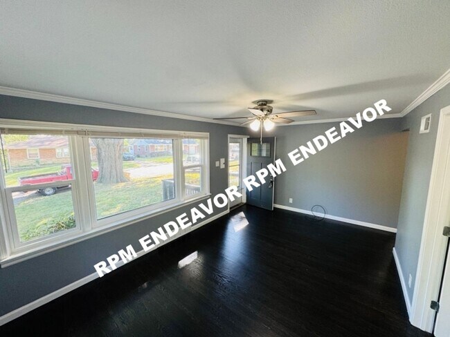 Building Photo - "Charming 4-Bedroom Haven with Sunroom, Ha...