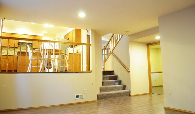 Building Photo - Private Summer Ridge Retreat with Vaulted Ceilings & Fenced Backyard