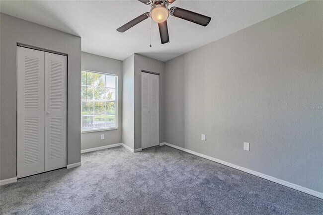 Building Photo - 9028 Lake Chase Island Way