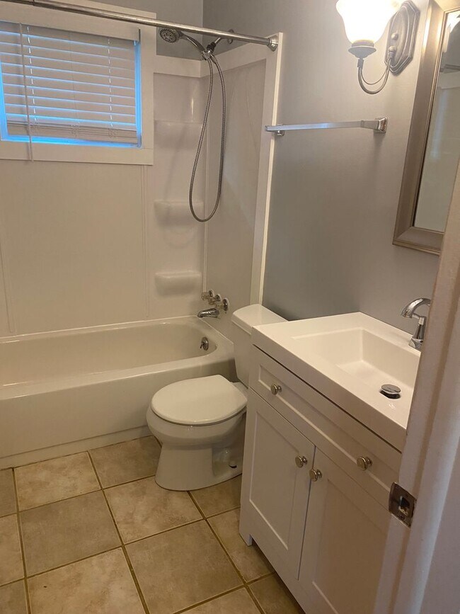 Building Photo - 2 bed, 1 bath ranch with partially finished basement & garage