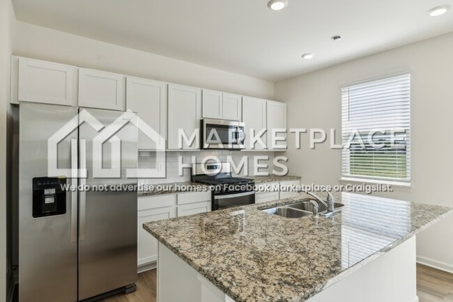 Building Photo - 7123 Train Station Way