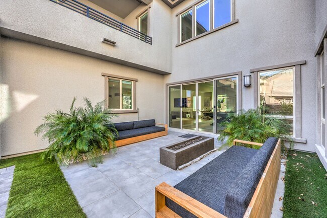 Building Photo - Exquisite 6-bed/ 6-bath residence nestled within the prestigious, guard-gated community of Revere...