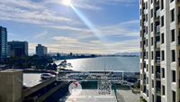 Building Photo - Stunning bay views in this light filled 1-...