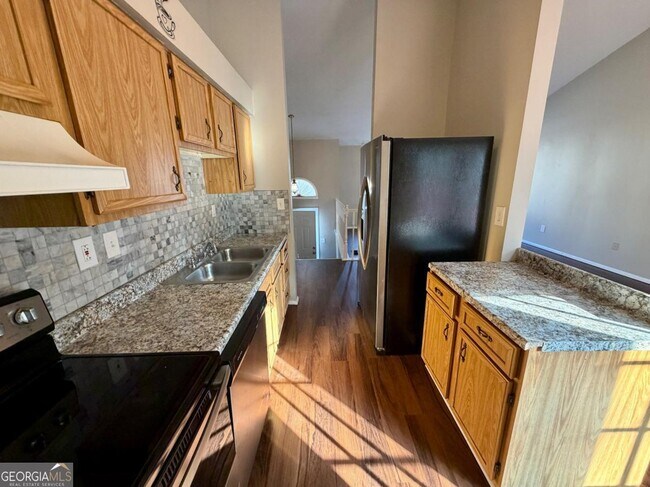 Building Photo - 6091 Raintree Bend