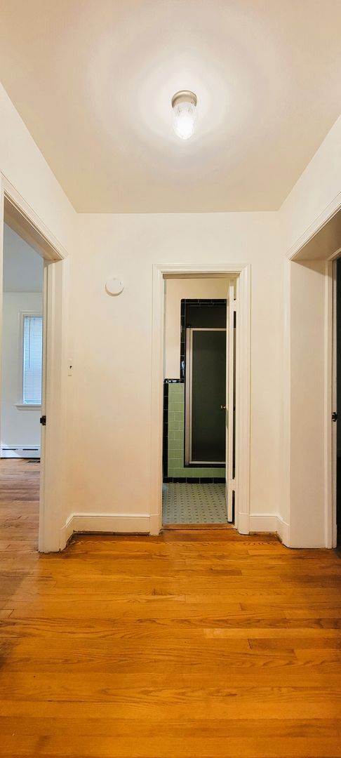 Building Photo - Remodeled brick bungalow with 1st floor li...