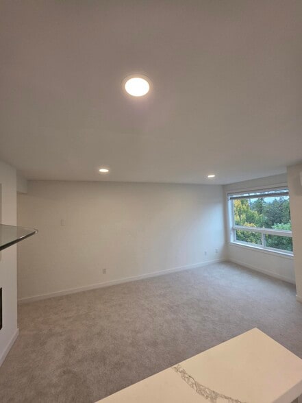 View of livingroom from Kitchen - 4100 Lake Washington Blvd N