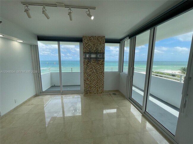 Building Photo - 8911 Collins Ave