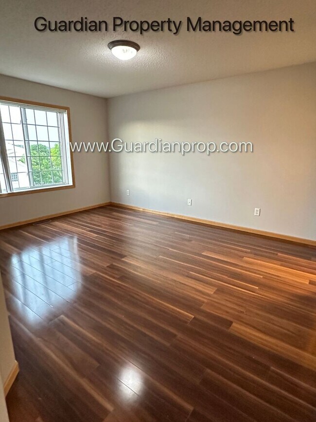 Building Photo - Maple Grove Town Home, 2 Car Garage, W/D, Balcony, Dishwasher, Avail June/July