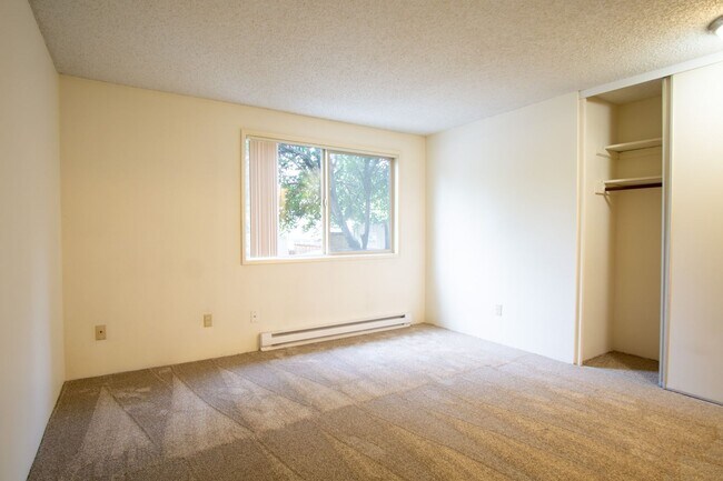 Building Photo - FREE RENT! Garden-Level 2 Bed 2 Bath with Large Patio, Parking, & W/D Hookups