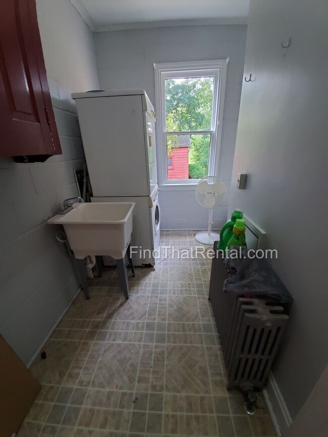 Building Photo - Charming Historic Retreat with Private Fenced Yard & Parking – Prime Downtown Location