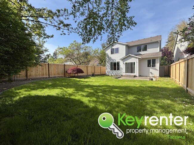 Building Photo - Elegant Browns Point Living with Backyard ...