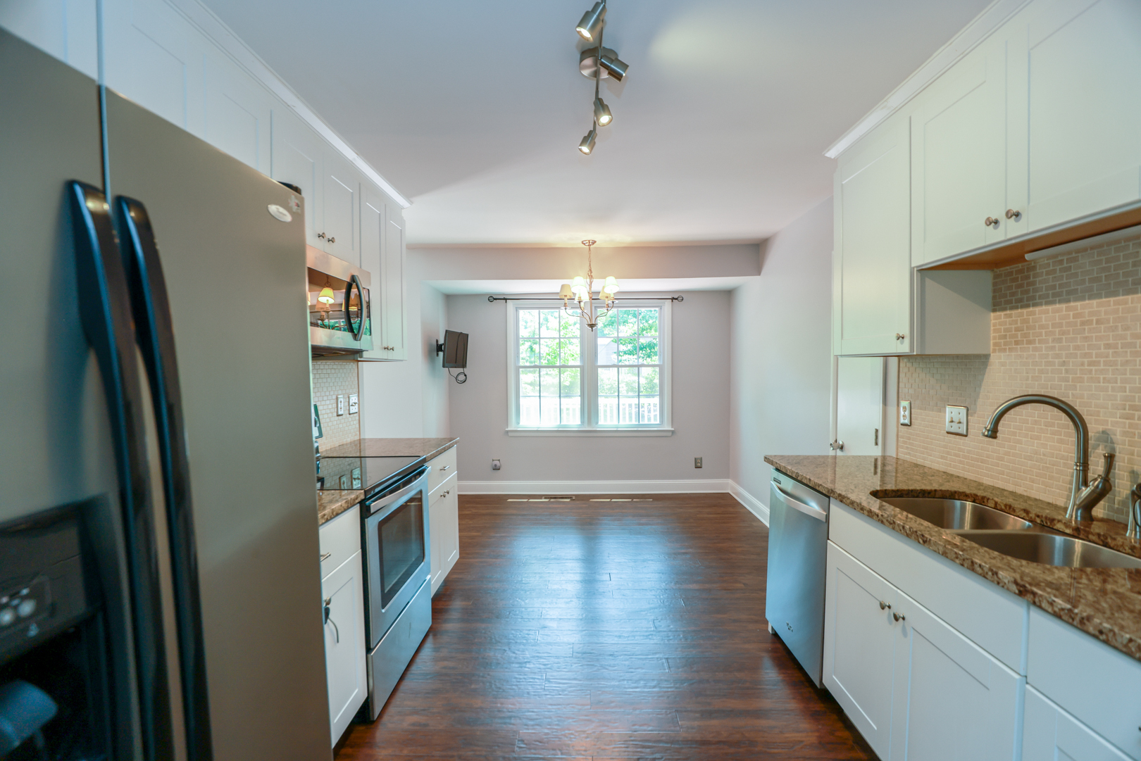 Kitchen connected to the dining room. - 701 Marbleridge Rd