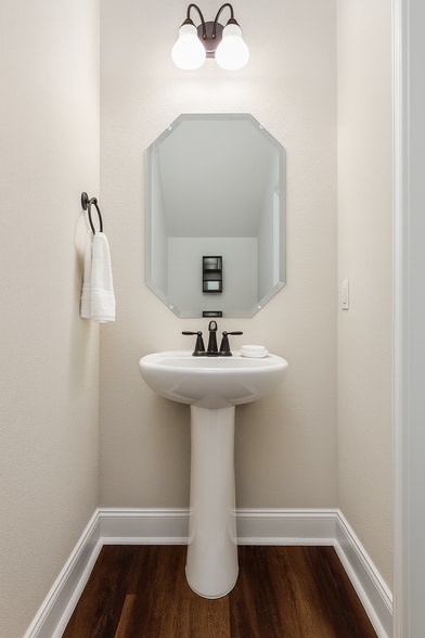 1 of 3 bathrooms. 2 full bathrooms and 1 half bathroom in common area. - 13810 Enzo Gate