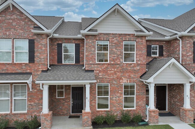 Building Photo - **BE THE LUCKY ONE TO LIVE IN THIS 2024-BUILT BRICK TOWNHOME IN THE VILLAS AT REGAL SQUARE FEATUR...