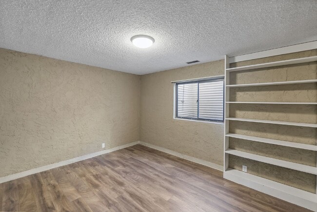 Building Photo - Spacious 4-Bedroom Home with Finished Basement, Large Deck & 2-Car Garage